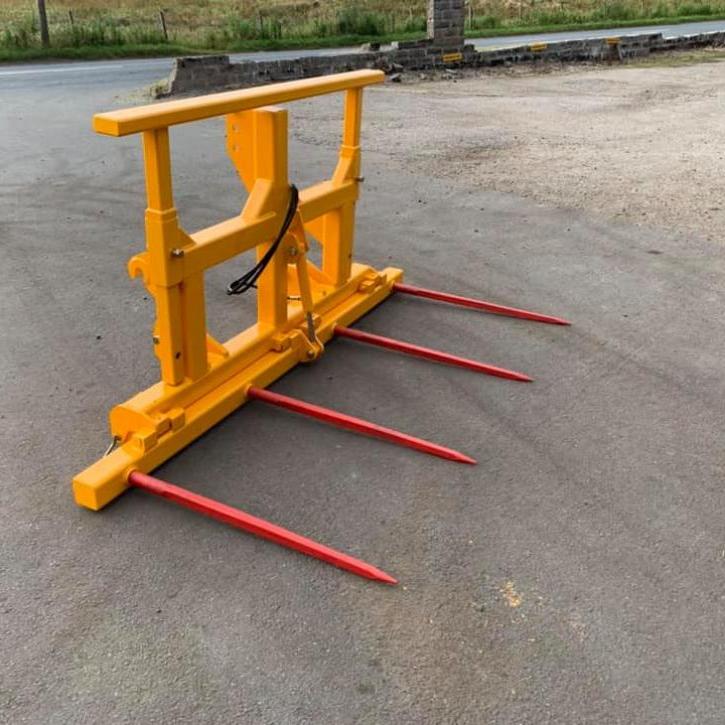 Double folding bale spike with removable goal post