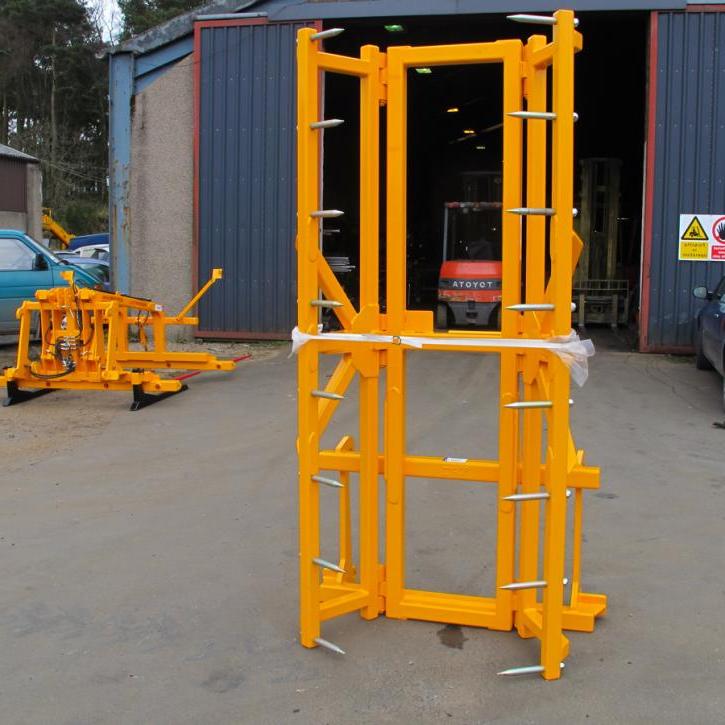 Murray Machinery Big Bale Stacker - for stacking round bales on their ends either 2 or 3 at a time. Showing the 3 bale version. The safest way to stack round bales.